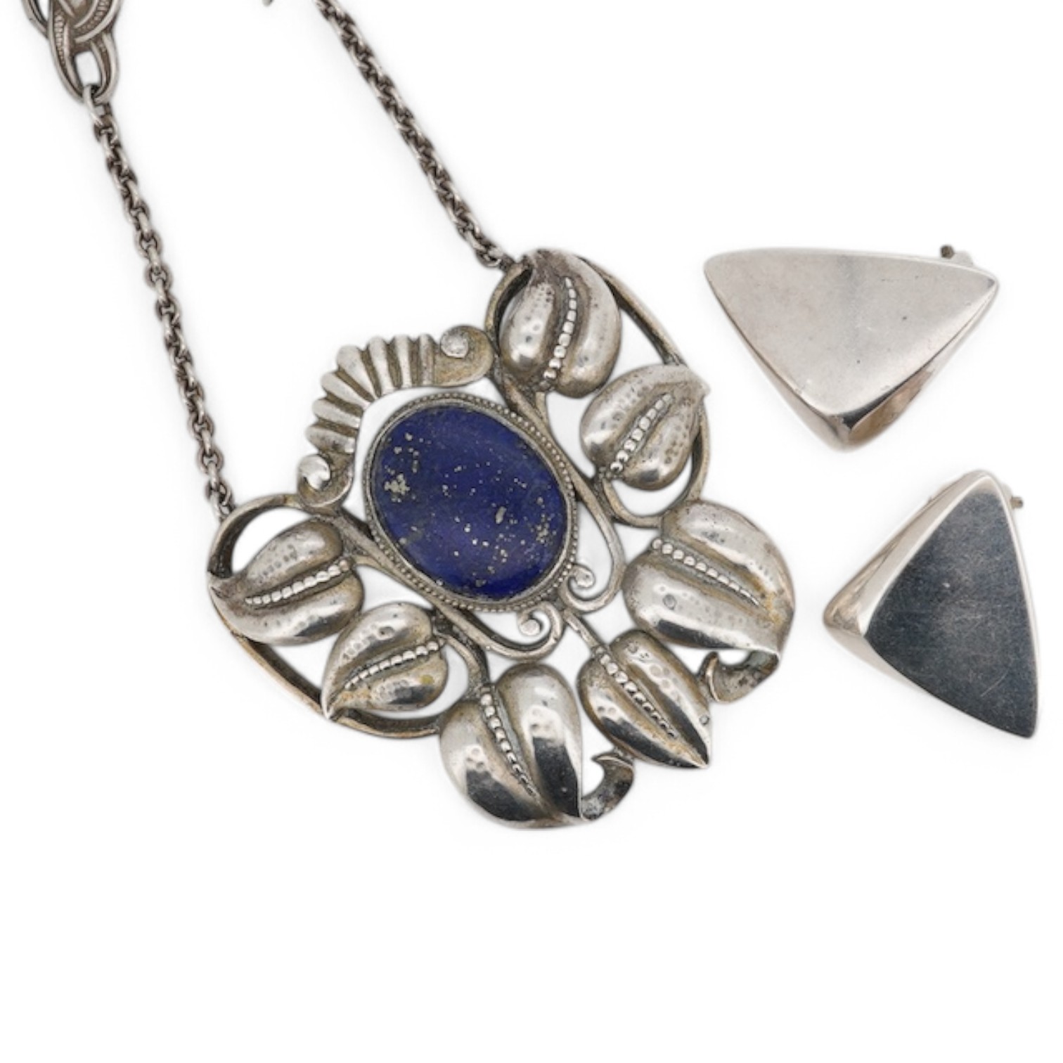 A Karl Karst 800 standard white metal and lapis lazuli set pendant necklace, 46cm, together with a pair of Georg Jensen ear clips. Condition - fair